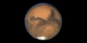 Mars - By NASA, ESA, and The Hubble Heritage Team (STScI/AURA) [Public domain], via Wikimedia Commons